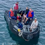 Returning from a snorkeling exploration at Floreanna Island.