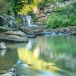 First view of the falls while hiking through the gorge. Early evening reflections. (7758)