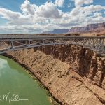 The bridge provides access to Lee's Ferry: the eastern boundary of the Grand Canyon Nat'l Park, the only easy access to the river by vehicles, and a popular launch point for rafting trips.  The bridge is 15 miles downstream of Lee's Ferry.