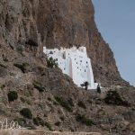 Dramatically built onto and into a sheer cliff, the structure is 131' high but only 16' deep. Tradition and historical sources place its founding in the 9th–11th centuries. It has eight levels connected by steep interior stairs. Note the stonework on the left side of the photo. (2807)