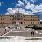 Since 1935, it has housed the Greek Parliament, symbolizing the country's transition from monarchy to parliamentary democracy. The Tomb of the Unknown Soldier stands directly in front of the building, and is guarded around the clock by the Evzones, members of the Presidential Guard. (4009)