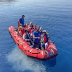 A ship's tender, usually just referred to as a "tender", is a boat for transporting people or supplies to and from shore. This was often our mode of transportation unless the ship was docked at port. (3734)