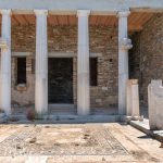 Hellenistic luxury residence dating to roughly 150–100 BCE. It is renowned for its distinctive black-and-white mosaic floors, the decorative animal figures attached midway up the columns, and a surviving example of patches of painted plaster (fresco plaster) on the wall to the right. (2723)