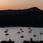 Silhouetted boats in the bay after sunset. (3224)