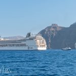 We arrived at the "new" main port where a bus was waiting to take us from sea level up the switchbacks to the top of the cliffs. As an aside, the two large cruise liners should have been a warning to us. (2841)