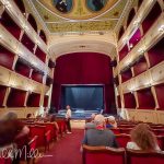 A miniature opera house inspired by the great theaters of Italy was built during Syros’ 19th-century commercial boom. Its red velvet balconies and ornate interior brought a touch of European grandeur to the Cyclades. (3862)