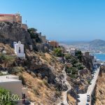 The setting is part of what makes it memorable. The cathedral doesn’t stand in isolation but is embedded in a living neighborhood of tight alleys, arches, and small courtyards, so the experience of reaching it is as much about the climb through Ano Syros as the church itself. From its terrace, you get one of the best panoramic views of Ermoupoli and the harbor below. (2955)