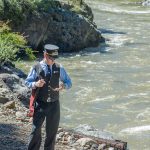 At the water stop pause, the conductor checks to be sure we are on schedule.