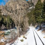 The Cascade Canyon Winter Train travels about 26 miles from Durango along the Animas River before reaching its turnaround point deep in the canyon. The approximately 4½-hour round trip replaces the summer journey to Silverton with a quieter winter experience.